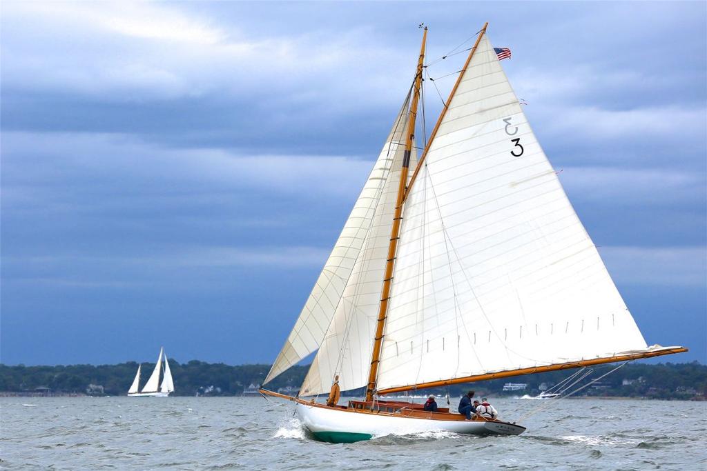 Nellie’s white sails against dark sky © M.A. Fisher Photography